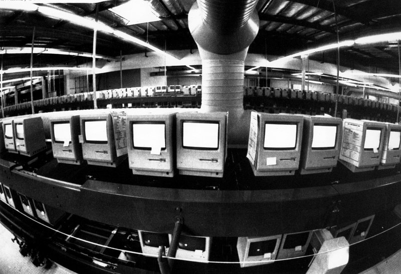 In this March 28, 1984, file photo, thousands of Apple Macintosh computers sit on double decked manufacturing lines. Friday, January 24, 2014, marks thirty years after the first Mac computer was introduced, sparking a revolution in computing and in publishing as people began creating fancy newsletters, brochures and other publications from their desktops.