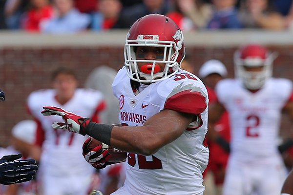 Arkansas' Jonathan Williams drives downfield in the fourth quarter during their game Saturday, Nov. 9, 2013 at Vaught-Hemingway Stadium in Oxford, Miss.