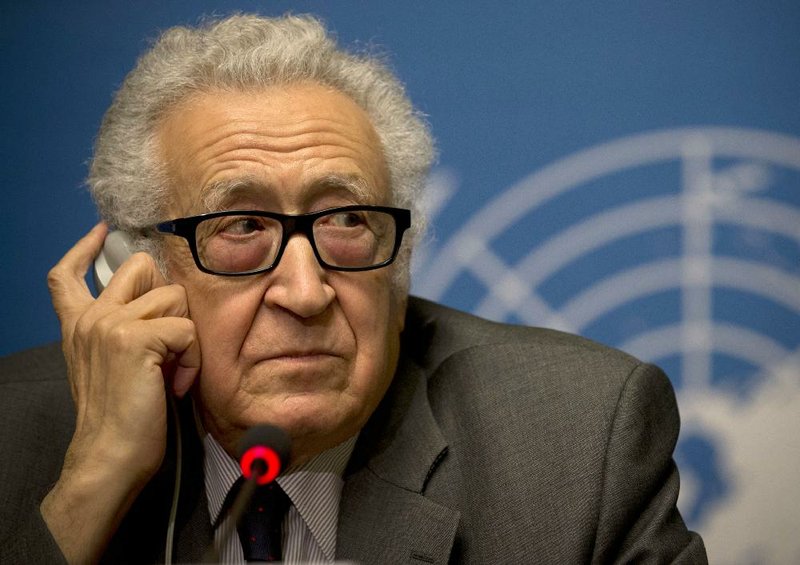 U.N. mediator Lakhdar Brahimi listens during a press briefing at the United Nations headquarters in Geneva, Switzerland, Friday, Jan. 24, 2014. After three days of escalating rhetoric _ and a day spent assiduously avoiding contact within the United Nations _ the two sides will meet in the same room, said the U.N. mediator trying to forge an end to the civil war _ or at least a measure of common ground to stem a civil war that has left 130,000 people dead. (AP Photo/Anja Niedringhaus)