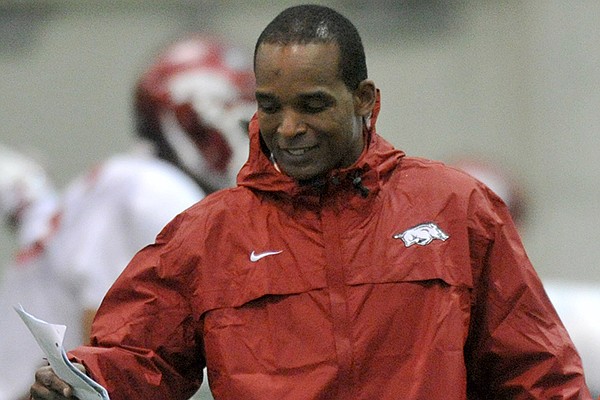 Arkansas linebackers coach Randy Shannon works during a spring practice in Fayetteville. 