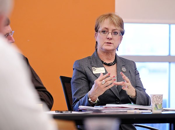 President Evelyn Jorgenson speaks during a meeting of the Northwest Arkansas Community College board of trustees in the Shewmaker Center for Global Business Development at NWACC's Bentonville campus on Friday January 24, 2014. The board voted to purchase a section of land with railroad tracks bisecting the NWACC campus from Arkansas & Missouri Railroad for $2.5 million.