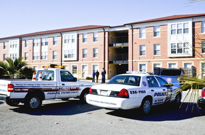 South Carolina State University's Hugine Suites was the scene of a fatal shooting Friday, Jan. 24, 2014. A student was shot and killed Friday outside an on-campus dormitory at South Carolina State University, and police were looking for four men who left campus. (AP Photo/Times & Democrat, Larry Hardy)