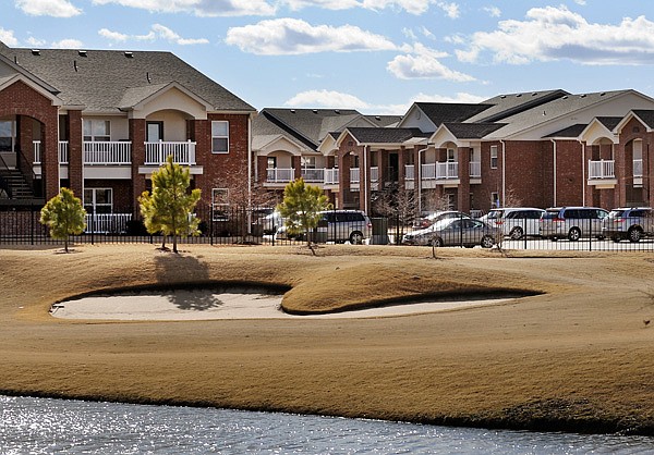 A view of The Links at Rainbow Curve apartments and golf course, a Lindsey Management Co., Inc. property, from Southwest Maple Road in Bentonville on Thursday January 16, 2014.