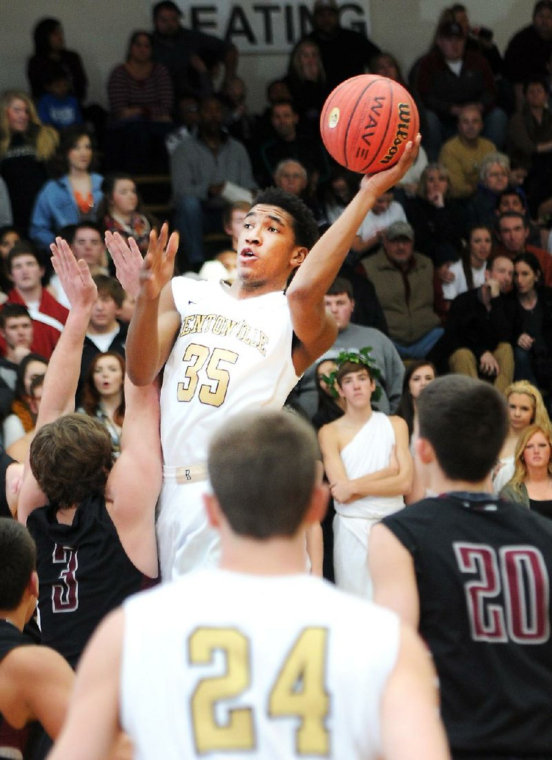 Bentonville’s Malik Monk (35) hit 11 three-pointers Friday night on his way to scoring 43 points in the Tigers’ 73-51 victory over Siloam Springs in Bentonville. 