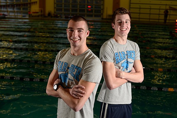 STAFF PHOTO ANTHONY REYES 
Ben, left, and John Parmer are brothers with the Har-Ber swim team. Ben, a senior, has qualified in five events for the state meet and John, a sophomore, has qualified in two events.