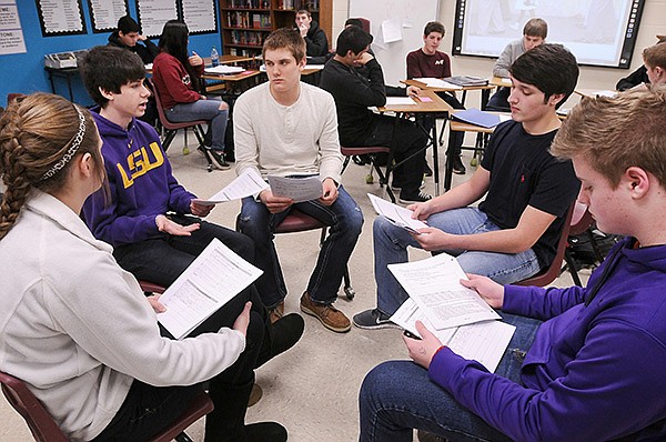 NWA Media/BEN GOFF 
Hannah Boydston (from left), 15, Mason Guillory, 16, John Hedgecock, 16, Delicio Sepulveda, 15, and Samuel Stubbs, 15, participate in a discussion of Martin Luther King Jr.’s book Why We Can’t Wait Monday in Heather Thompson’s sophomore English class at Bentonville High School. Students at the high school participated in a nine-week study of segregation and the Civil Rights movement.