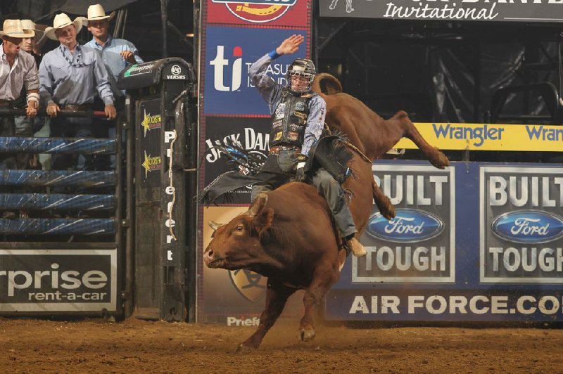 Kasey Hayes holds on as the bull Rio Grande tries to throw him off. Hayes is part of the Professional Bull Riders Velocity Tour coming to Verizon Arena Saturday. 