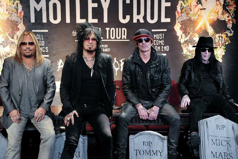 From left, Vince Neil, Nikki Sixx, Tommy Lee, and Mick Mars attend the Motley Crue Press Conference, Tuesday, Jan. 28, 2014, in Los Angeles. The heavymetal band says it will retire after performing 72 goodbye concerts. 
