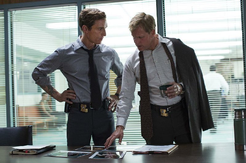 Matthew McConaughey (left) and Woody Harrelson’s new series, True Detective, can be seen on HBO. 