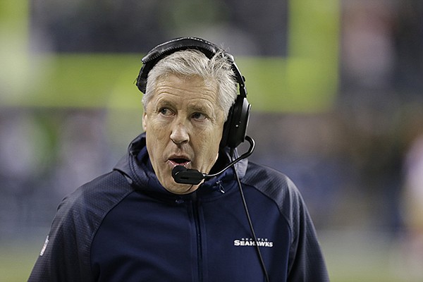 Seattle Seahawks head coach Pete Carroll speaks during the second half of the NFL football NFC Championship game against the San Francisco 49ers Sunday, Jan. 19, 2014, in Seattle. (AP Photo/Elaine Thompson)