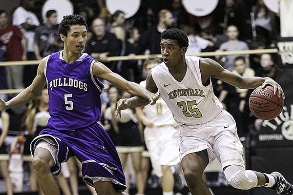 Payton Willis of the Bulldogs guards Malik Monk of the Tigers at Tiger Arena, Bentonville High School in Bentonville on Jan. 31, 2014.