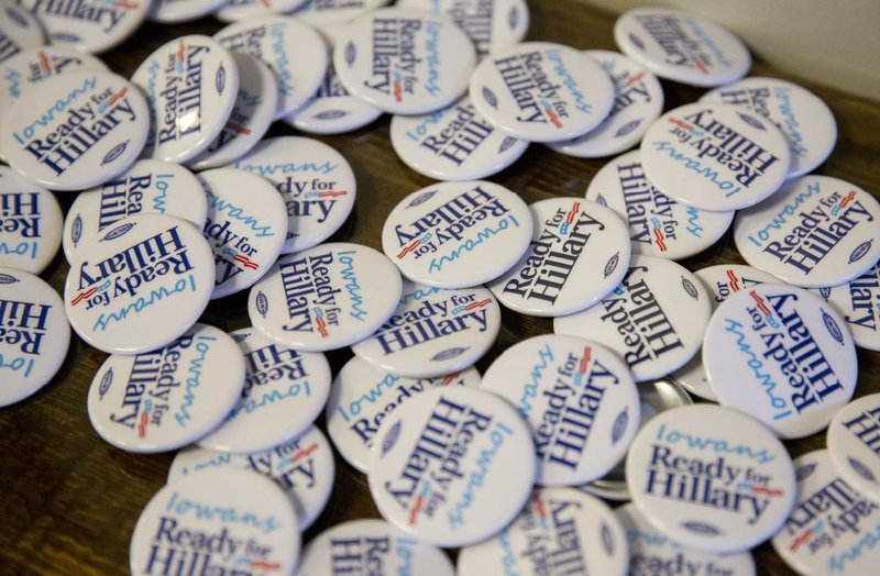 Campaign buttons sit ready at an event organized by the national Ready for Hillary group in Des Moines, Iowa, on Jan. 25. Leaders of the super-PAC say they are focusing on grass-roots support despite large donations from rich backers of Hillary Rodham Clinton. 