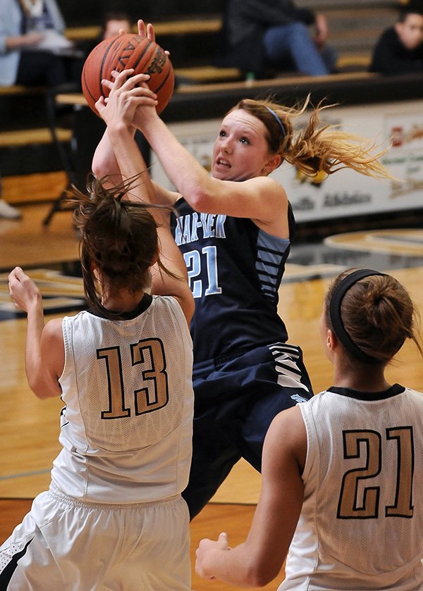 FILE PHOTO BEN GOFF 
Paige Redmond of Springdale Har-Ber puts up a shot Jan. 14 against Bentonville’s Jordan Martin at Tiger Arena in Bentonville. Redmond is the 7A/6A-West Conference Girls Player of the Week.