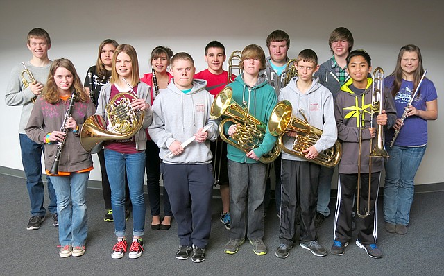 Photo by Randy Moll Qualifying for all-region band at a recent band clinic in Mountain Home were: Ariel King (front, left), Courtney McCollum, Sam Bennett, Parker McCollum, Wyatt Philpott, Vince Rajsombath, Brandon Brigance (back, left), Katelyn Lopez, Caitlin Cox, Justin Hazard, Curtis Philpott, Derek Wood and Destiny Bolles.