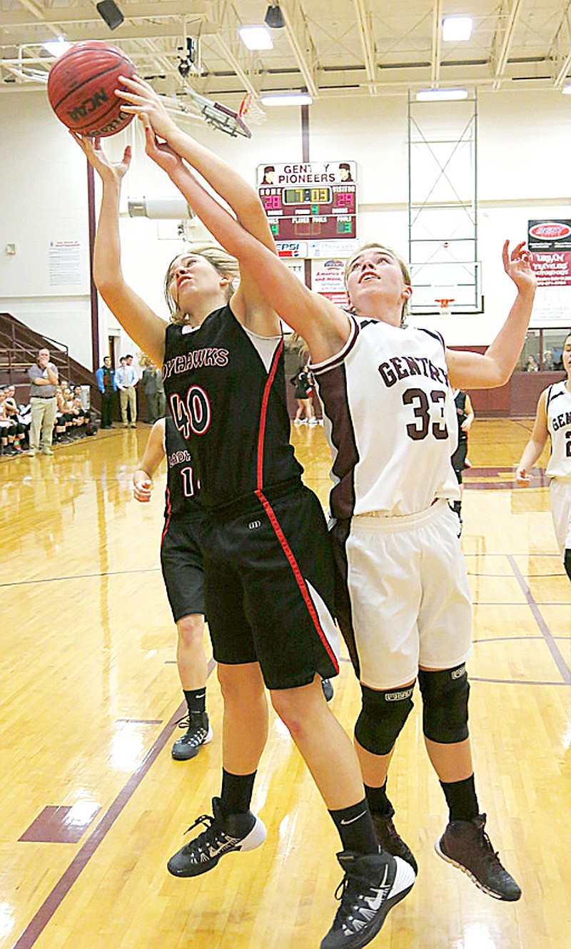 NAN photograph by Randy Moll Lady Blackhawk senior Carley Sanders, No. 40, battles against a Lady Pioneer for control of the basketball during the game Tuesday, Jan. 28, in Gentry.