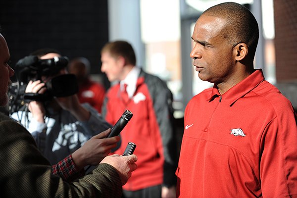Randy Shannon, Arkansas assistant coach and linebackers coach, speaks to members of the media during a National Signing Day ceremony Wednesday, Feb. 5, 2014, at the university's football complex.