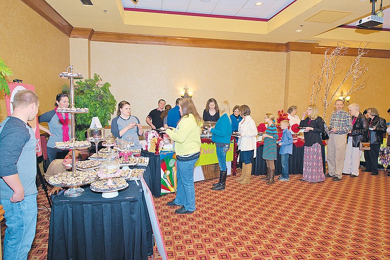The Hot Springs Chocolate Festival hosted more than 700 people who sampled the candies, cupcakes, doughnuts and other sweets provided by 17 vendors at the Embassy Suites Hot Springs-Hotel & Spa on Sunday. The annual event is a major fundraiser for the Charitable Christian Medical Clinic in Hot Springs.