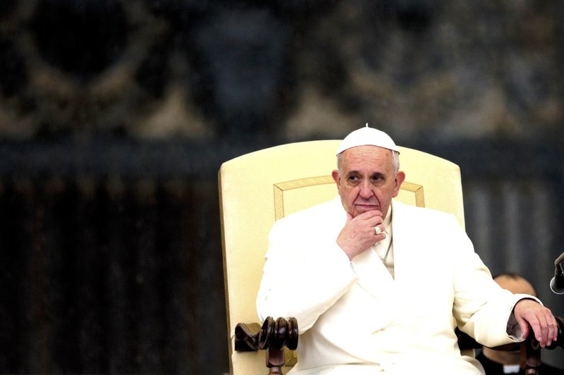 Pope Francis listens to his speech being translated in several languages, during his weekly general audience in St. Peter's Square at the Vatican, Wednesday, Feb. 5, 2014. A U.N. human rights committee denounced the Vatican on Wednesday for “systematically” adopting policies that allowed priests to rape and molest tens of thousands of children over decades, and urged it to open its files on the pedophiles and the bishops who concealed their crimes. 