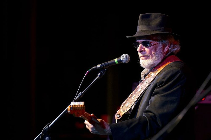 Merle Haggard picks out his signature sound on his Fender Telecaster with his band the Strangers at the Perot Theater on Wednesday night, Feb. 5, 2014.