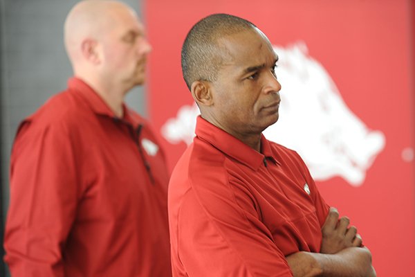 Randy Shannon, Arkansas assistant coach and linebackers coach, listens during a National Signing Day ceremony Wednesday, Feb. 5, 2014, at the university's football complex.