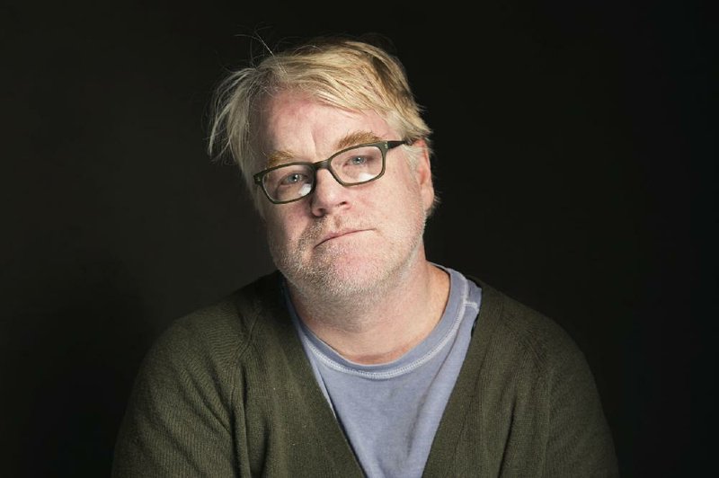 FILE - In this Jan. 19, 2014 file photo, Philip Seymour Hoffman poses for a portrait at The Collective and Gibson Lounge Powered by CEG, during the Sundance Film Festival, in Park City, Utah. Hoffman, 46, who won the Oscar for best actor in 2006 for his portrayal of writer Truman Capote in "Capote," was found dead Sunday, Feb. 2, in his New York apartment.  (Photo by Victoria Will/Invision/AP, file)