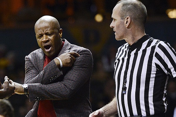 Arkansas head coach Mike Anderson reacts after an official called a foul on one his players in the first half of an NCAA college basketball against Vanderbilt game Saturday, Feb. 8, 2014, in Nashville, Tenn. (AP Photo/Mark Zaleski)