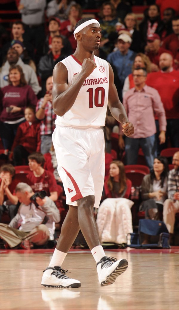 Arkansas freshman Bobby Portis celebrates during the closing moments of the second half of play against Alabama Wednesday, Feb. 5, 2014, in Bud Walton Arena in Fayetteville.