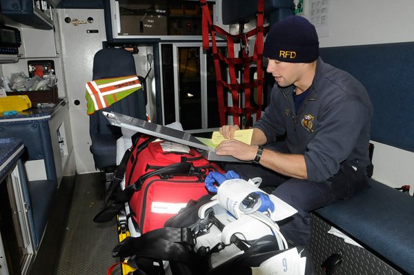 Joshua Kirts, a Rogers firefighter and paramedic student, shows on Tuesday Feb. 4 2014 how ambulances and medical supplies are inspected at the start of each shift.