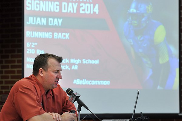 Arkansas football coach Bret Bielema talks about the Arkansas Razorbacks' new players during the national signing day press conference at the Fred Smith Center in Fayetteville.