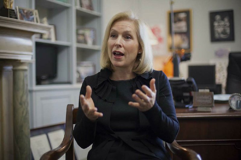This photo taken Jan. 21, 2014 shows Sen. Kirsten Gillibrand, D-N.Y., chair of the Senate Armed Services subcommittee on Personnel, discussing her proposed reforms for prosecuting sexual assaults in the military, during an interview with The Associated Press in her Capitol Hill office in Washington. An Associated Press investigation into the military’s handling of sexual assaults in Japan has found a pattern of random and inconsistent judgments in which most offenders are not incarcerated. Instead, commanders have ordered “nonjudicial punishments” that ranged from docked pay to a letter of reprimand.   (AP Photo/J. Scott Applewhite)