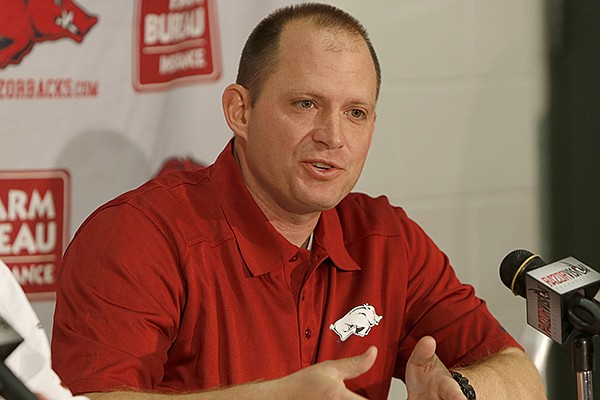 Arkansas football defensive coordinator and secondary coach Robb Smith speaks at a press conference Monday morning Feb. 10, 2014 at the Fred W. Smith Football Center. 