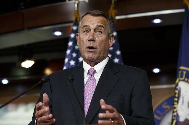 House Speaker John Boehner of Ohio speaks during a news conference on Capitol Hill in Washington on Thursday, Feb. 6, 2014. Boehner said Thursday that it will be difficult to pass immigration legislation this year, dimming prospects for one of President Barack Obama's top domestic priorities.