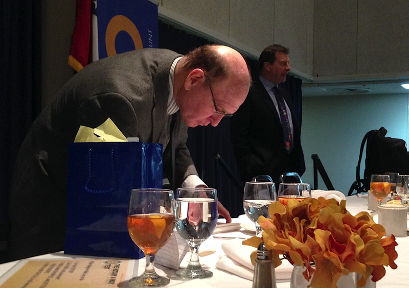 Wrestling legend Dan Gable speaks to patrons after his address at the Little Rock Rotary Club on Tuesday afternoon. Gable was in town to promote the Arkansas State Wrestling Tournament, which begins Friday. 