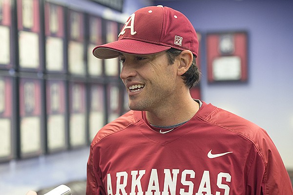 Tony Vitello, assistant coach for the Arkansas baseball team, talks with the media Friday, Feb. 7, 2014 at the University of Arkansas baseball media day at Baum Stadium in Fayetteville.