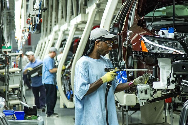 Workers assemble Volkswagen Passat sedans at the German automaker’s plant in Chattanooga, Tenn., in June. 