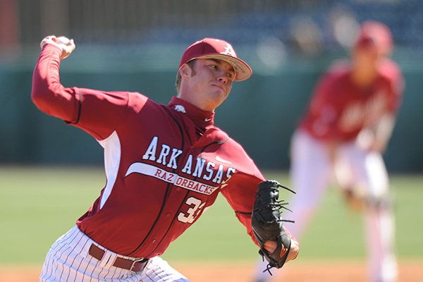 Arkansas reliever Trey Killian delivers a pitch Tuesday, March 26, 2013, during the fifth inning of play against Mississippi Valley State at Baum Stadium in Fayetteville.