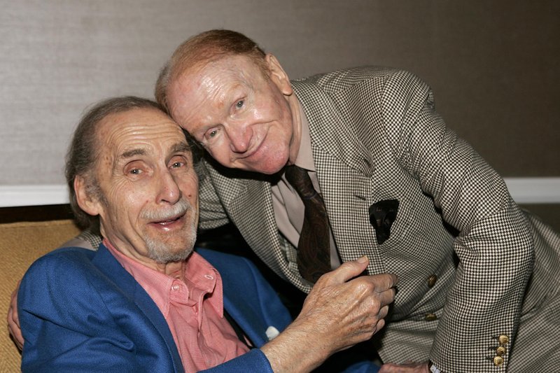 FILE - This July 12, 2005 file photo shows comedians Sid Caesar, left, and Red Buttons at the Television Critics Association PBS Press Tour in Beverly Hills, Calif. Caesar, whose sketches lit up 1950s television with zany humor, died Wednesday. He was 91. 