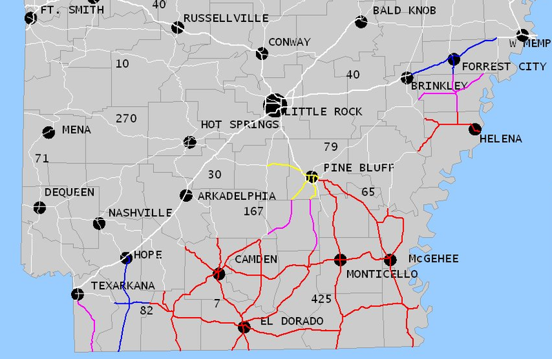 A screenshot from the Arkansas State Highway and Transportation Department road condition map shows slick conditions in much of southern Arkansas. Red represents ice, pink ice patches, green slush, yellow sleet and blue snow. 