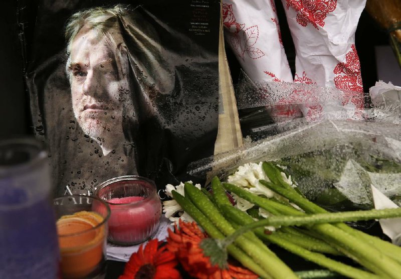 A makeshift memorial is seen outside the building where the body of actor Philip Seymour Hoffman was found in New York. Hoffman, 46, was found dead Feb. 2 in his apartment. 