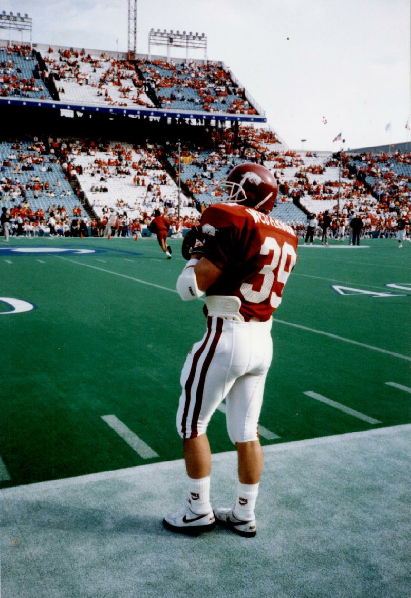 This photo of House Majority Leader Bruce Westerman warming up on the sidelines for the Arkansas Razorbacks during the 1990 Cotton Bowl was featured in a campaign advertisement released Wednesday. 