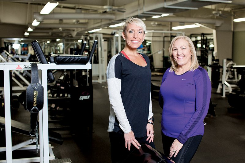 Trainer Amanda Castillo, left, worked with Sherrie Hartzell, 54, at Conway Regional Health and Fitness Center to overcome her fear of exercise after Hartzell had a heart attack and bypass surgery in 2009 at age 49. February is American Heart Month. Heart disease is the No. 1 killer of women, according to the American Heart Association.