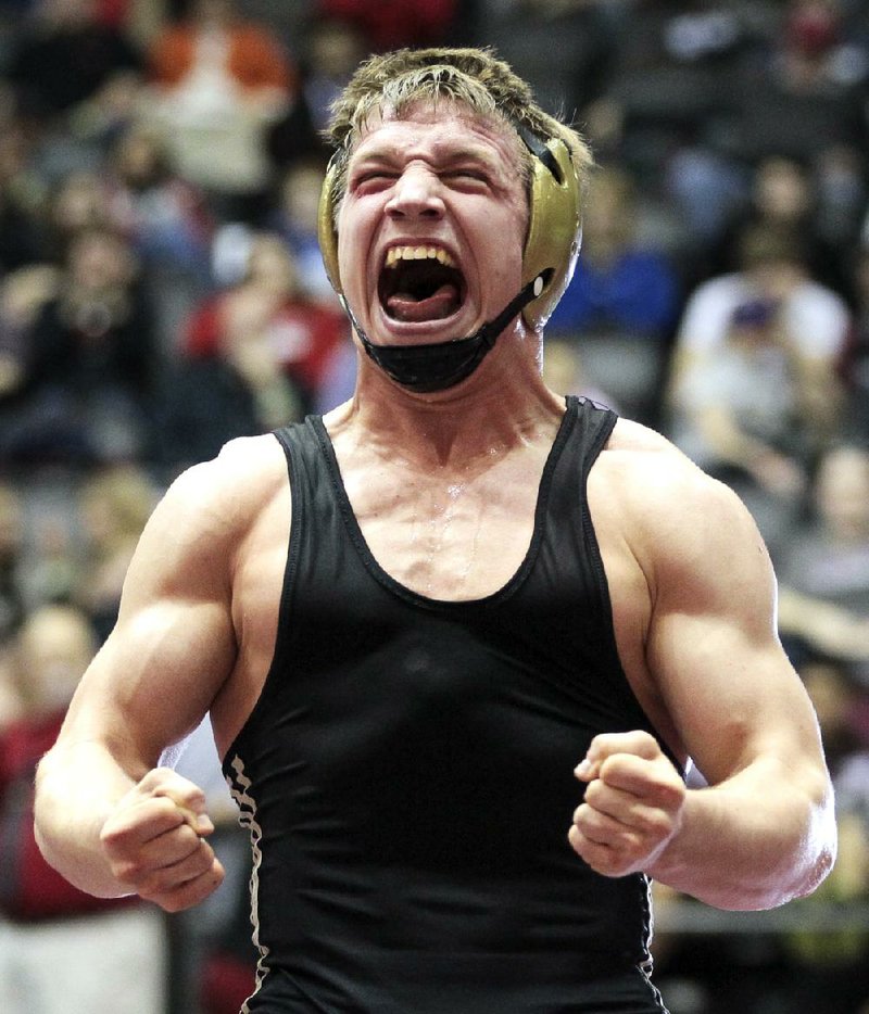 Arkansas Democrat-Gazette/BENJAMIN KRAIN --2/15/2014--
Tyler Mann, from Little Rock Central, celebrates after defeating Dane Shields, from Fayetteville, in the Class 6A-7A, 160 weight division of the high school state wrestling tournament. The victory is Mann's fourth straight championship.