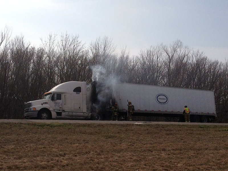 Little Rock firefighters put out a tractor-trailer fire Monday morning, Feb. 17, 2014 on Interstate 30.