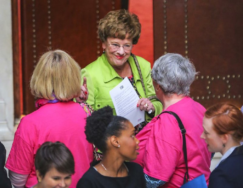 State Sen. Jane English, R-North Little Rock, said “a lot of folks are going to hate me” for switching her vote on the private option, but she said a funding boost for job training was “a game changer.” 