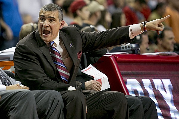 South Carolina head coach Frank Martin yells at his bench during the second half of an NCAA college basketball game against Arkansas, Wednesday, Feb. 19, 2014, in Fayetteville, Ark. (AP Photo/Gareth Patterson)