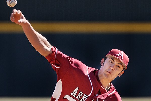 Arkansas pitcher Chris Oliver delivers the ball during game two of the series against Appalachian State on Saturday Feb. 15, 2014 at Baum Stadium in Fayetteville. 