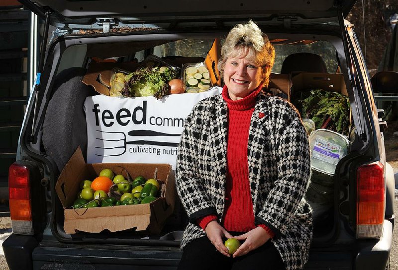 NWA Media/ANDY SHUPE - Denise Garner is the founder and president of Feed Communities/Fayetteville. Thursday, Feb. 13, 2014.