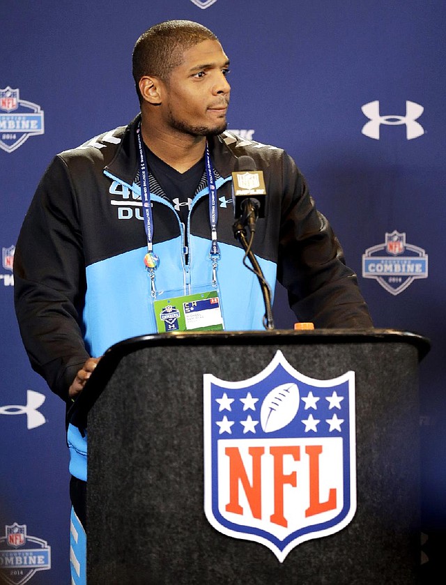 Missouri defensive end Michael Sam told members of the media at the NFL Scouting Combine that he wants to be recognized for his ability as a football player, not because of his sexuality. 