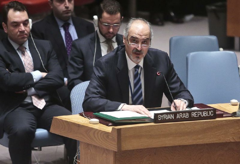 Syrian Ambassador to the United Nations Bashar Ja'afari speaks after a U.N. Security Council vote on the Syria humanitarian crisis at the U.N. headquarters on Saturday, Feb. 22, 2014. The council united for the first time on the resolution demanding that President Bashar Assad's government and the opposition provide immediate access everywhere in the country to deliver aid to millions of people. (AP Photo/Bebeto Matthews)