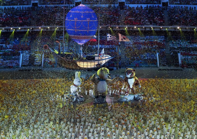 Dancers perform with large mascots during the closing ceremony of the 2014 Winter Olympics on Sunday, Feb. 23, 2014, in Sochi, Russia. 